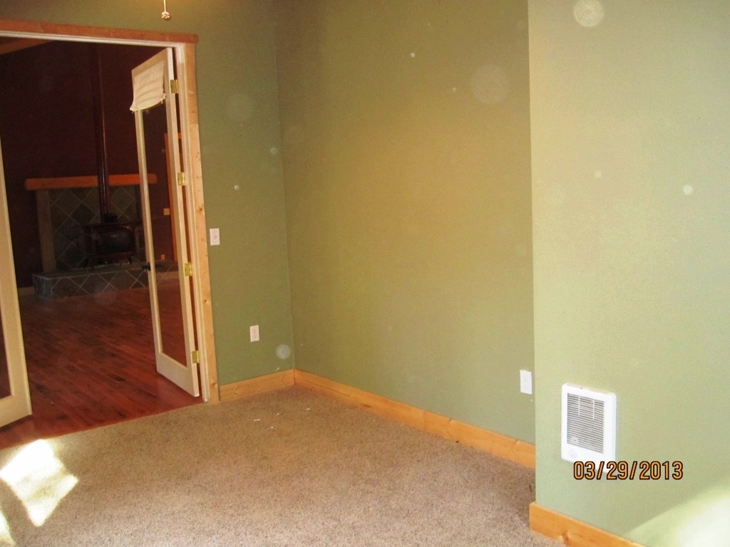 8567 Lake McCumber Road Shingletown, CA 96088 - Photo 18 of 39 den wall