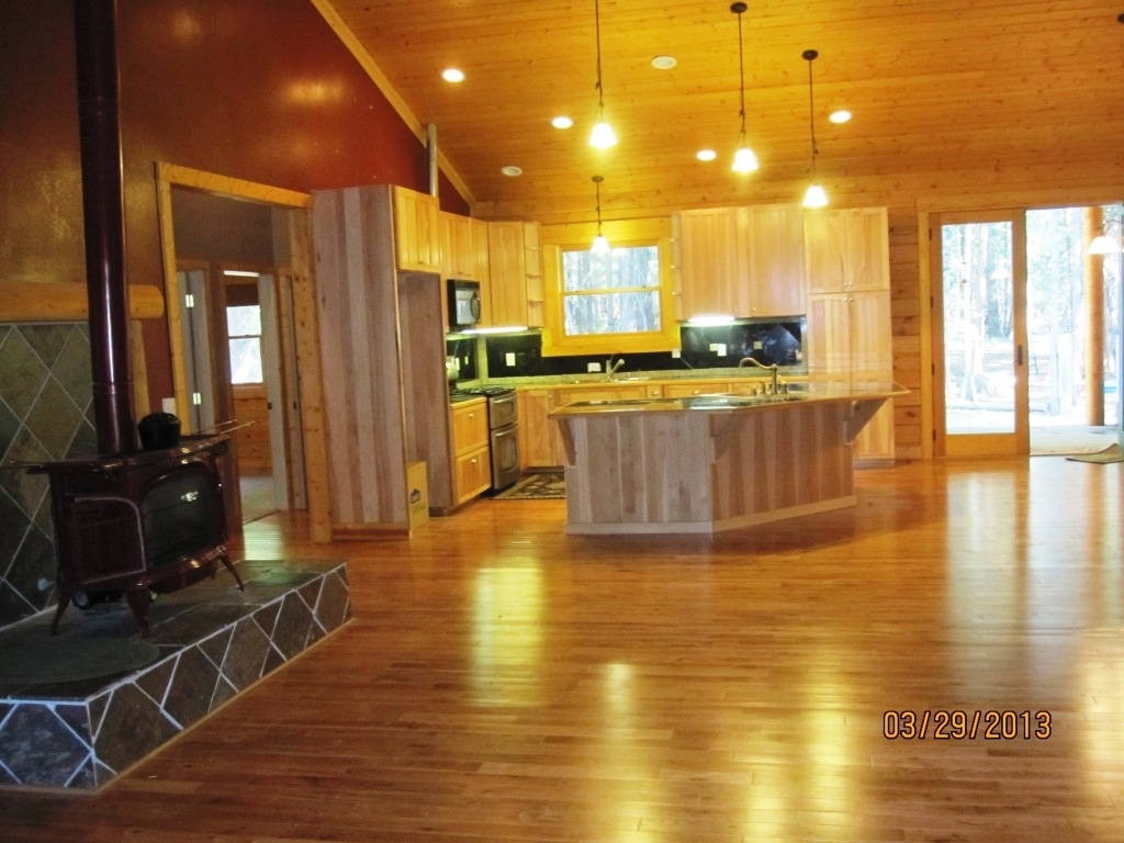 8567 Lake McCumber Road Shingletown, CA 96088 - Photo 3 of 39 living to kitchen