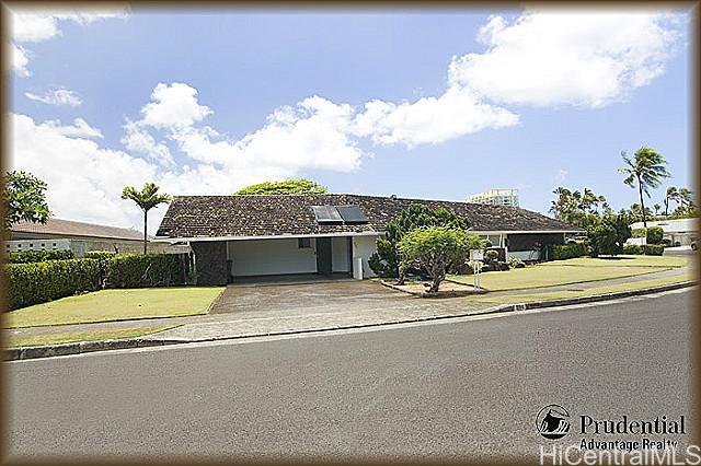 984 Waiholo Street Honolulu, HI 96821 - Photo 1 of 1 a front view of a house with a yard and garage