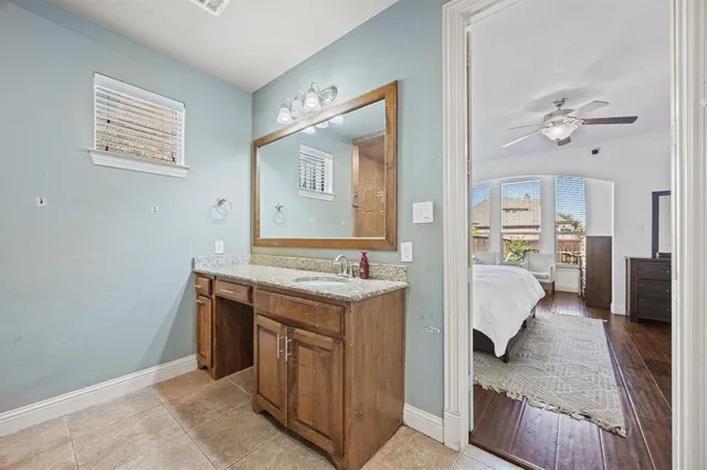 a view of a kitchen area with furniture and wooden floor