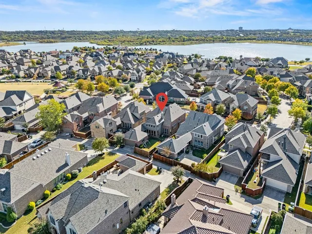 an aerial view of a city with lots of residential buildings