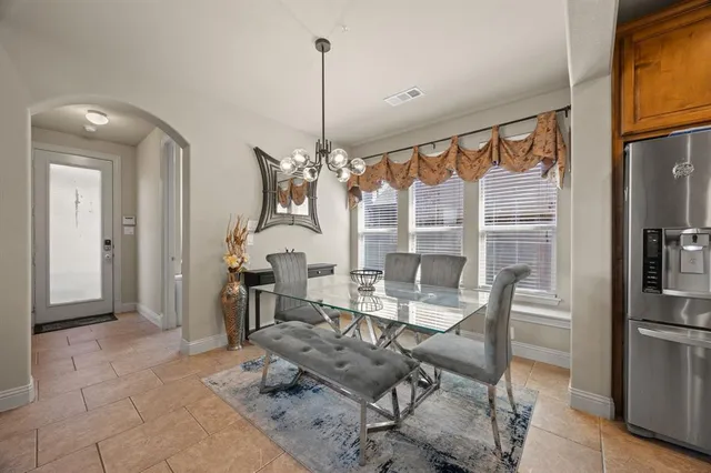 a view of a livingroom with furniture window and wooden floor
