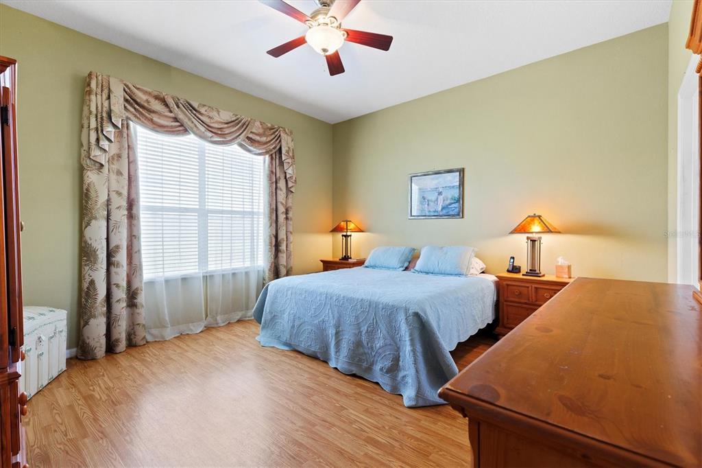 17739 Southeast 121st Terrace Road Summerfield, FL 34491 - Photo 14 of 48 a bedroom with beds and a window