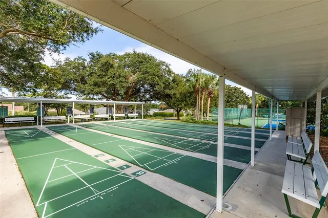 a view of an outdoor space and tennis court