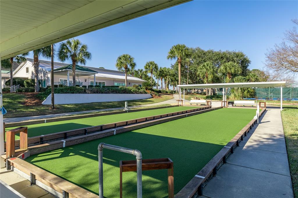17739 Southeast 121st Terrace Road Summerfield, FL 34491 - Photo 48 of 48 a view of swimming pool with seating area