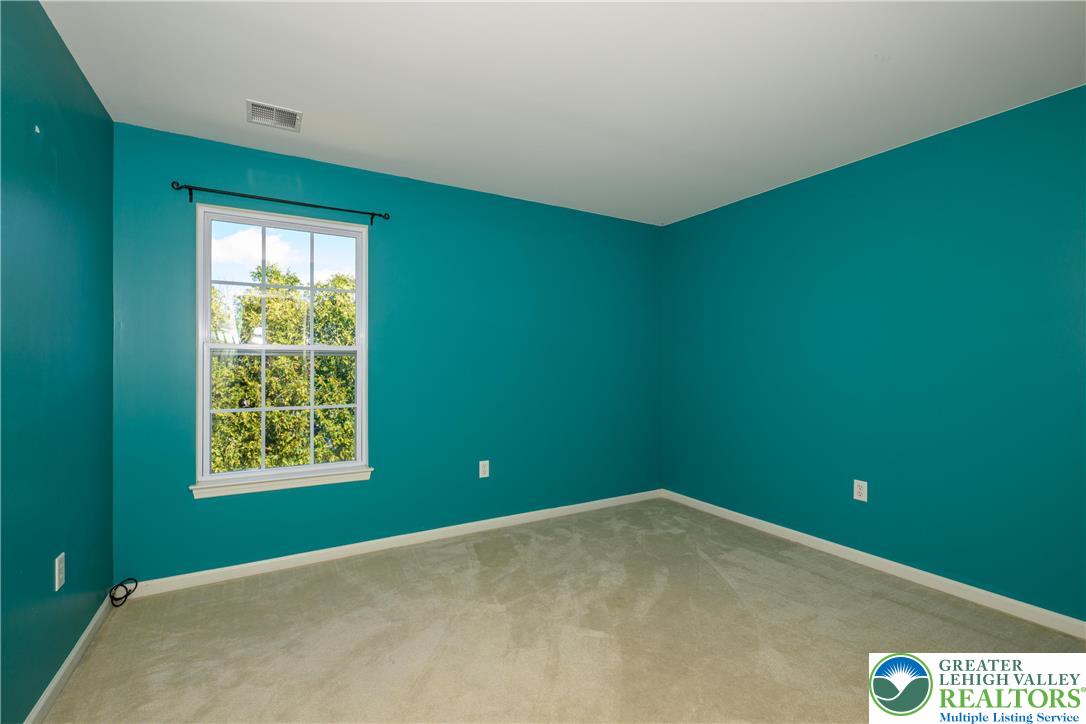 1252 Center Street Coplay, PA 18037 - Photo 24 of 63 a view of an empty room with window and fan