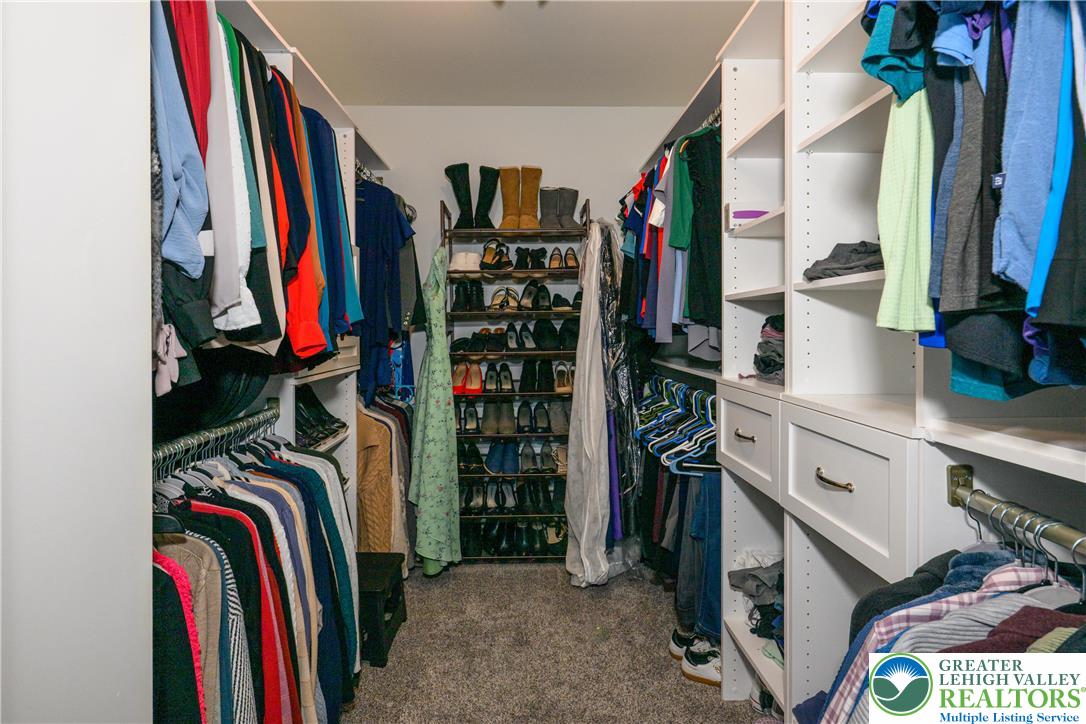 1252 Center Street Coplay, PA 18037 - Photo 32 of 63 a view of walk in closet with clothes and shoes