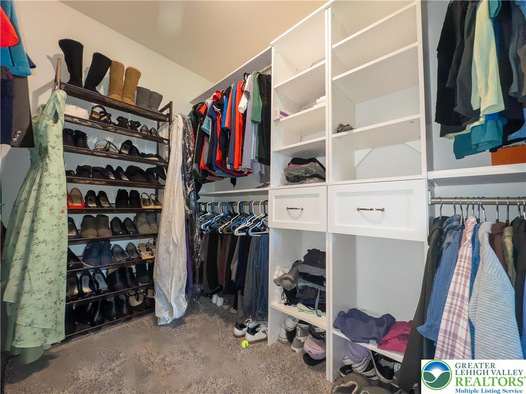 1252 Center Street Coplay, PA 18037 - Photo 33 of 63 a view of walk in closet with clothes and shoes