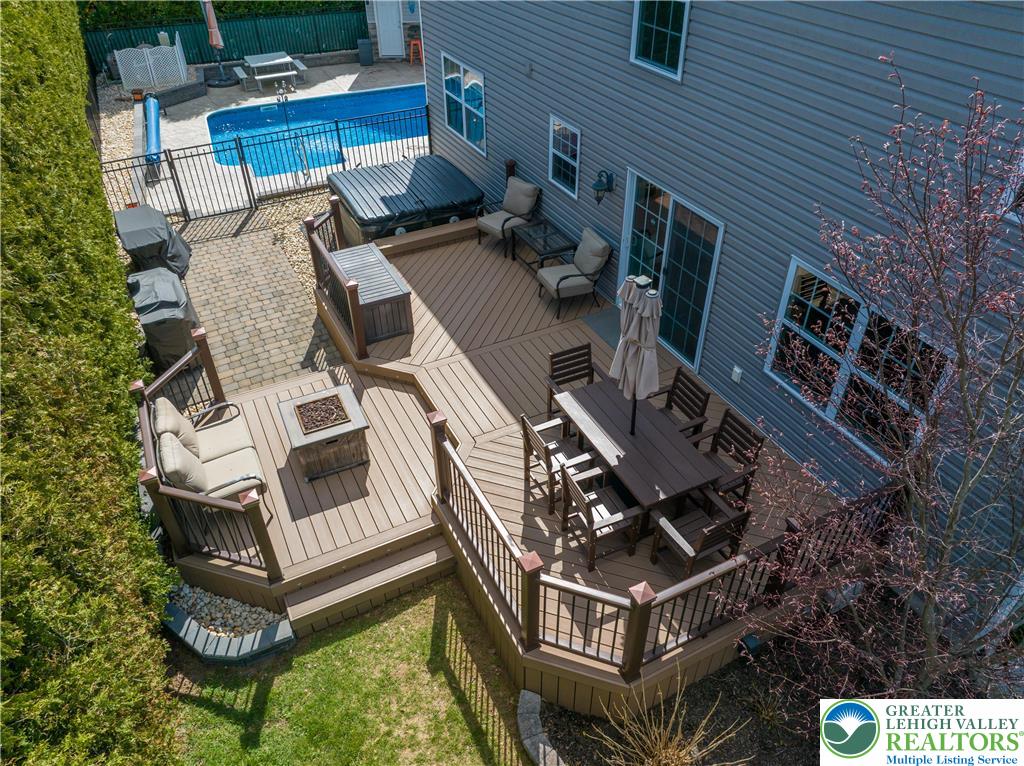 1252 Center Street Coplay, PA 18037 - Photo 50 of 63 a view of a patio with table and chairs and potted plants