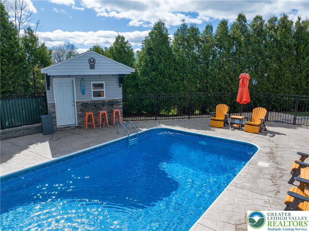 1252 Center Street Coplay, PA 18037 - Photo 53 of 63 swimming pool view with a seating space and garden view