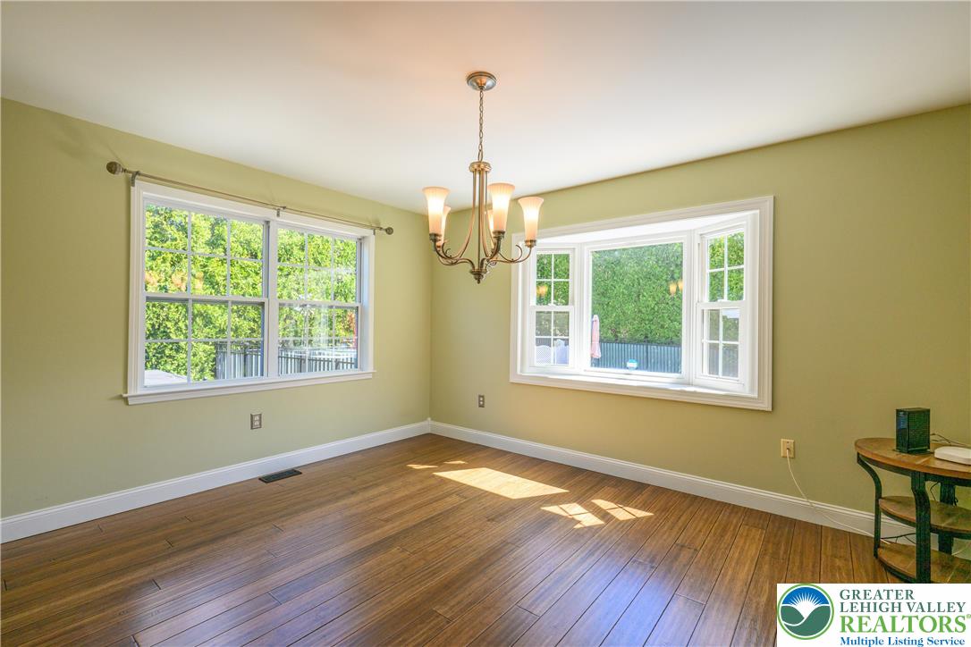 1252 Center Street Coplay, PA 18037 - Photo 9 of 63 a view of empty room with wooden floor and fan