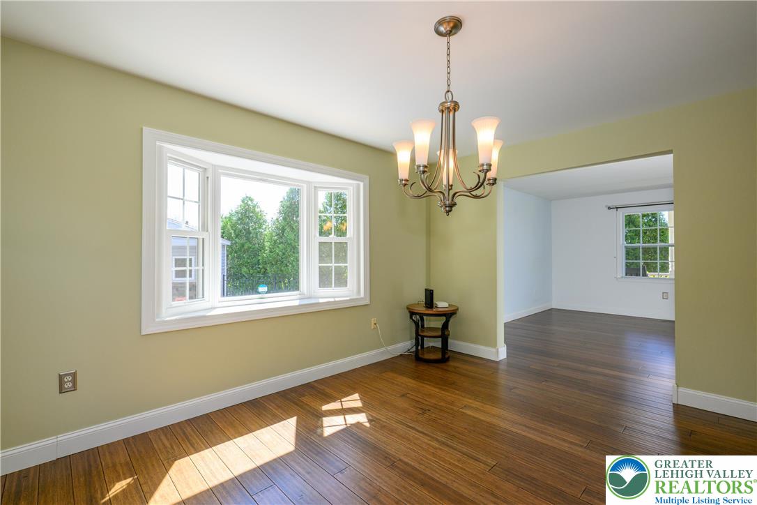 1252 Center Street Coplay, PA 18037 - Photo 10 of 63 a view of empty room with wooden floor and fan
