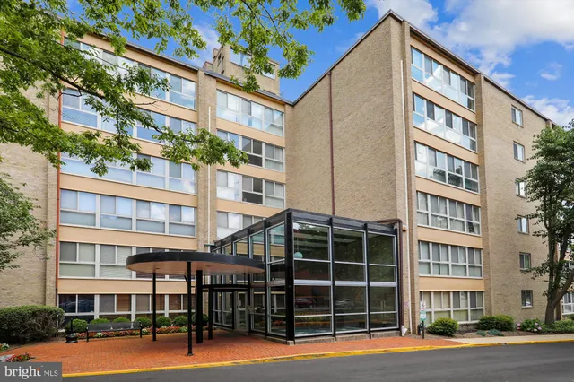 a view of a building with a street