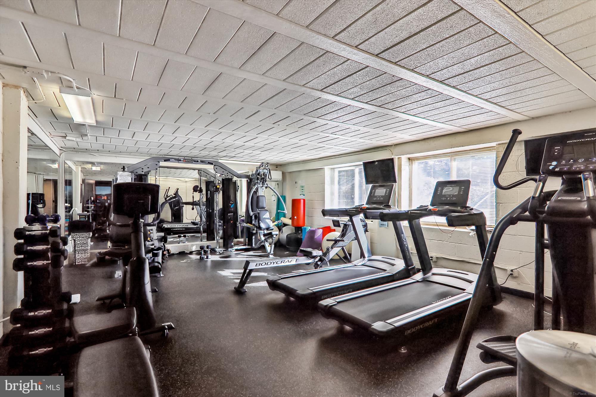 4970 Battery Lane, Unit 408 Bethesda, MD 20814 - Photo 28 of 40 a view of a room with gym equipment