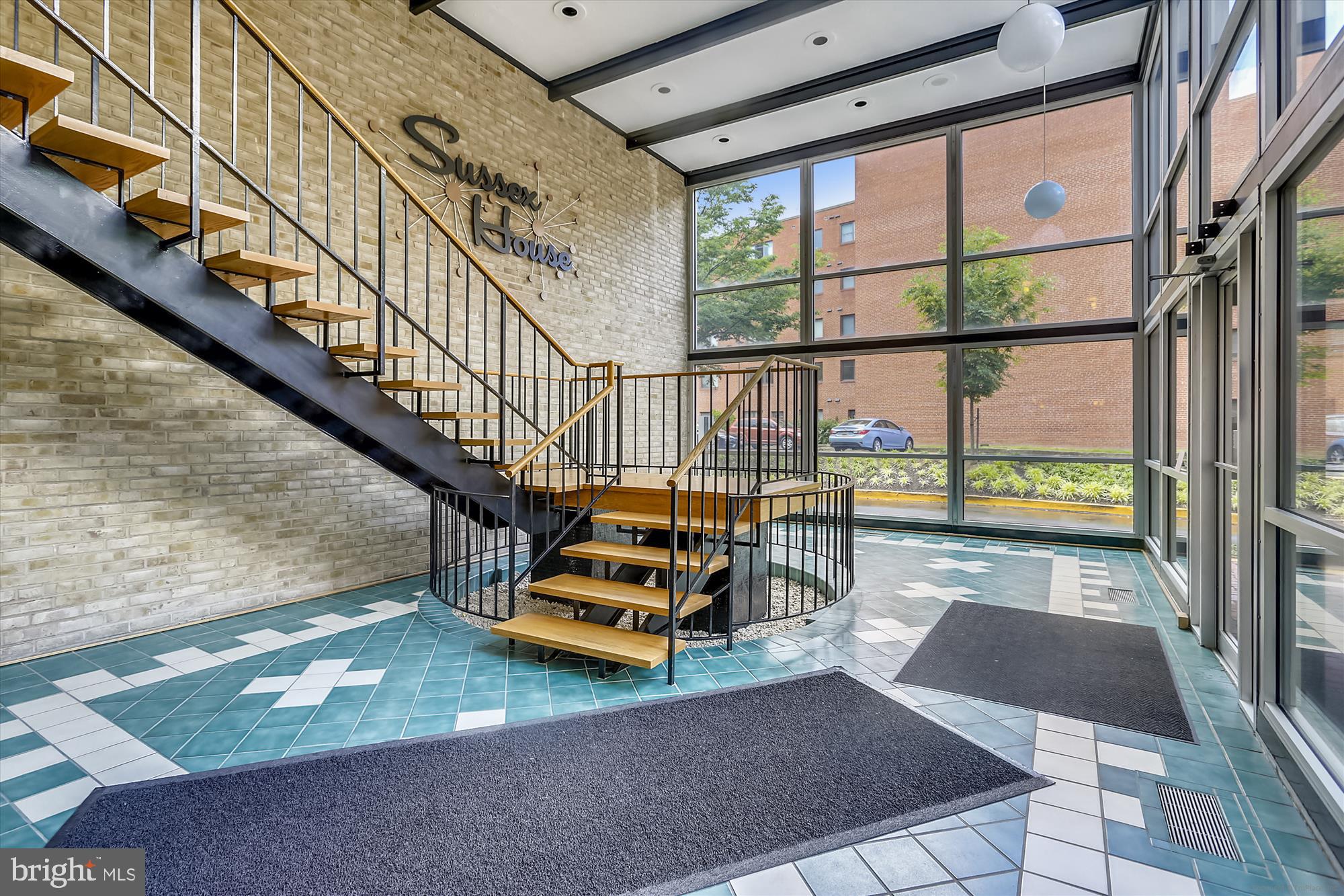 4970 Battery Lane, Unit 408 Bethesda, MD 20814 - Photo 3 of 40 a view of staircase with a rug
