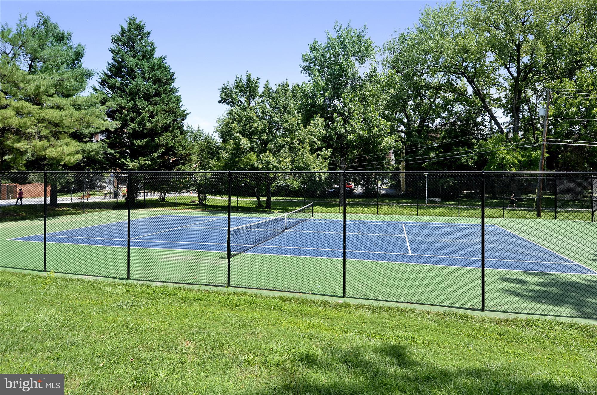 4970 Battery Lane, Unit 408 Bethesda, MD 20814 - Photo 34 of 40 a view of a tennis court