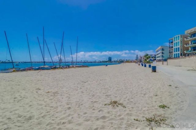 a front view of a building with a yard