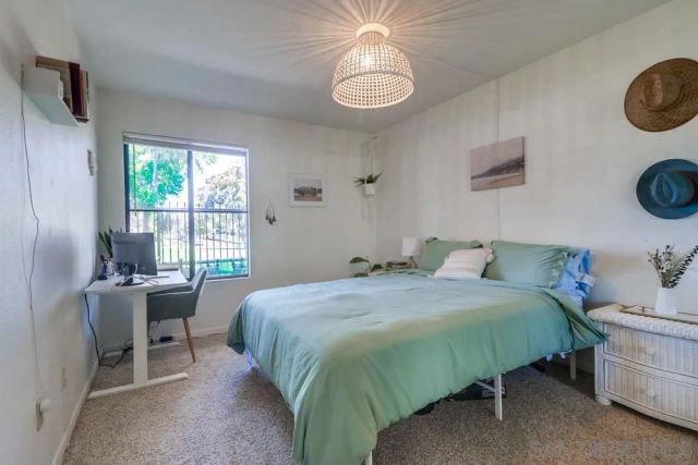 a en suite bathroom with a double vanity sink mirror and shower