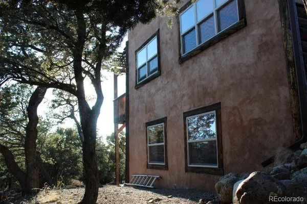 a view of balcony with wooden floor