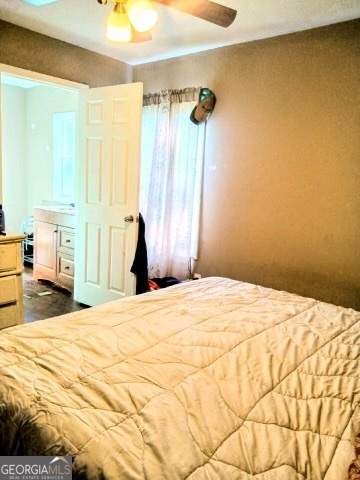 67 Glenloch Road Roopville, GA 30170 - Photo 6 of 11 a bedroom with a bed and a dresser