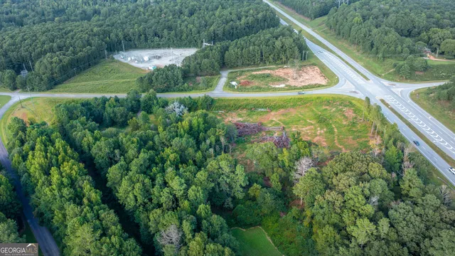 a view of a back yard from a balcony
