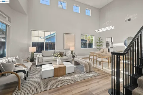 a living room with furniture and a table