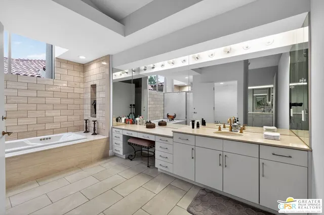 a bedroom with two beds and a night stand