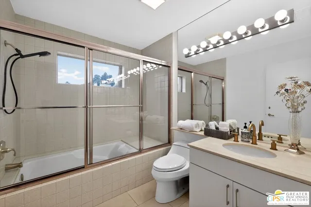 a kitchen with a table and chairs in it