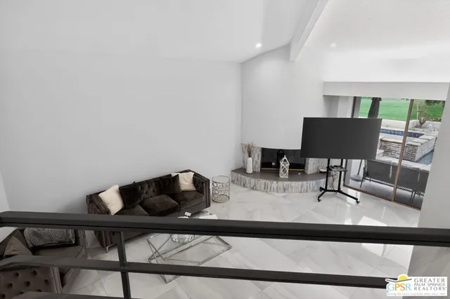 a building outdoor space with patio furniture and potted plants