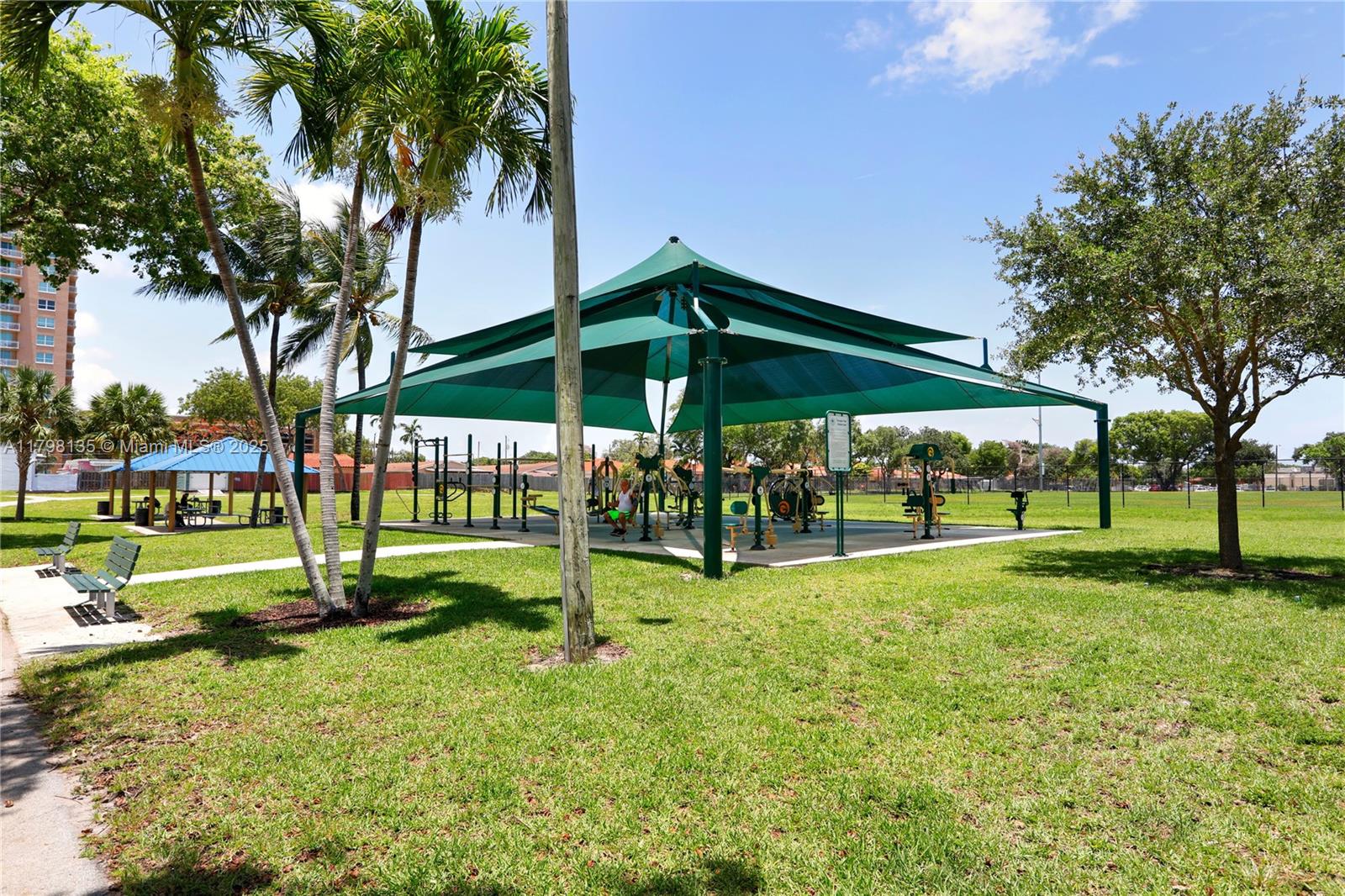 2665 Southwest 37th Avenue, Unit 1506 Miami, FL 33133 - Photo 19 of 19 a view of a park with swings