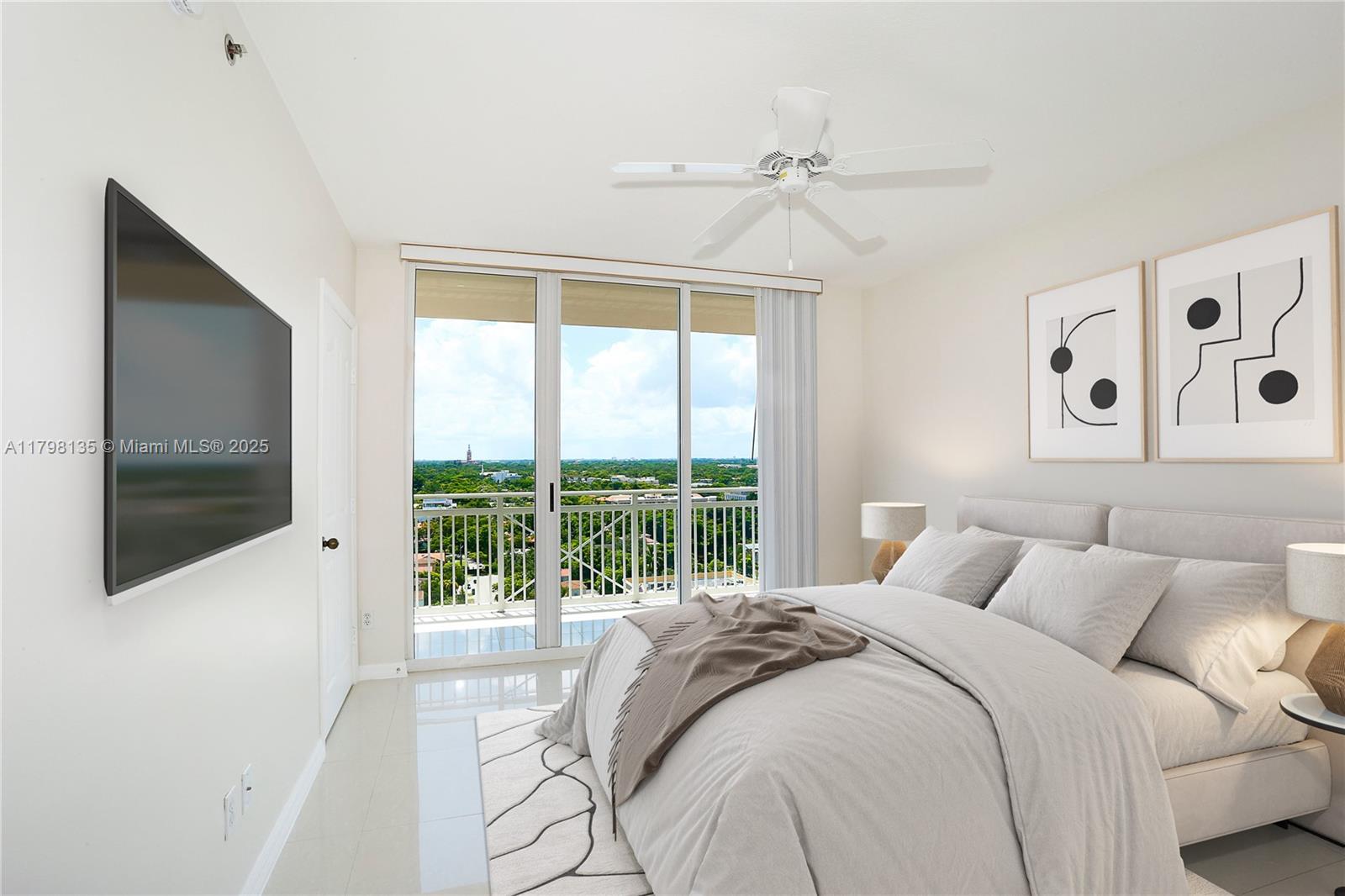 2665 Southwest 37th Avenue, Unit 1506 Miami, FL 33133 - Photo 4 of 19 a bedroom with a large bed and a large window