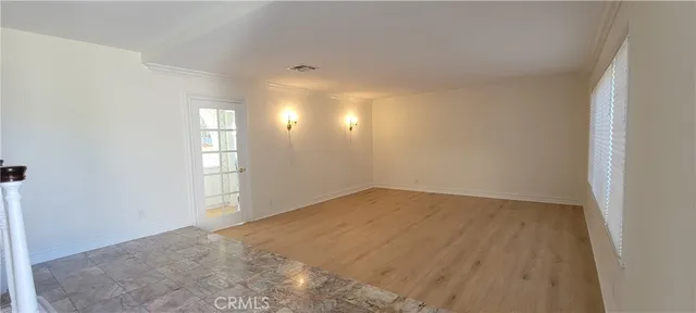 a view of an empty room and window