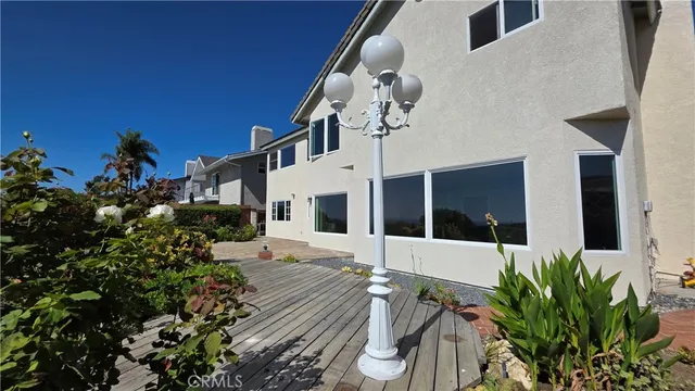 a bathroom with a sink double vanity and a large mirror