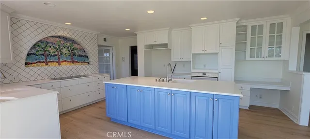 a view of a living room and a large window