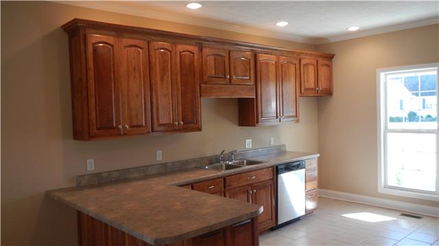 1205 East End Road Manchester, TN 37355 - Photo 6 of 14 Great natural light from the large window. Breakfast bar and space for an informal dining area.