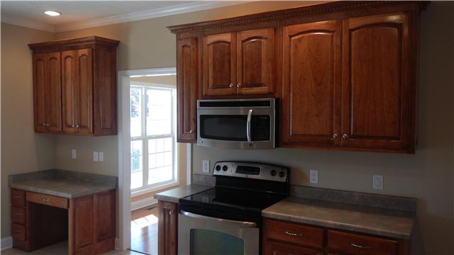 1205 East End Road Manchester, TN 37355 - Photo 7 of 14 Microwave and stove included! Nice desk area to the left.