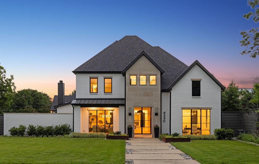 4330 Ridge Road Dallas, TX 75229 - Photo 1 of 30 a front view of a house with garden