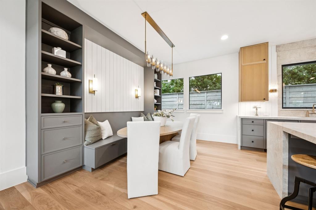 4330 Ridge Road Dallas, TX 75229 - Photo 12 of 30 a kitchen with a stove a sink and a refrigerator