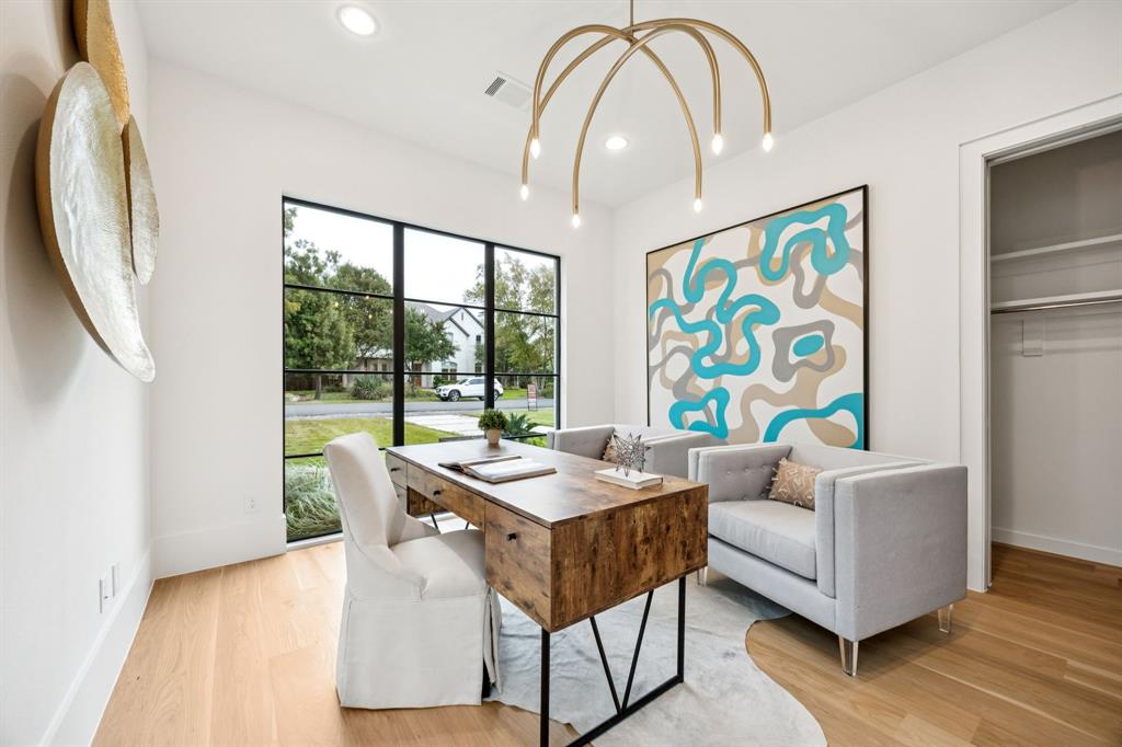 4330 Ridge Road Dallas, TX 75229 - Photo 18 of 30 a living room with furniture and wooden floor