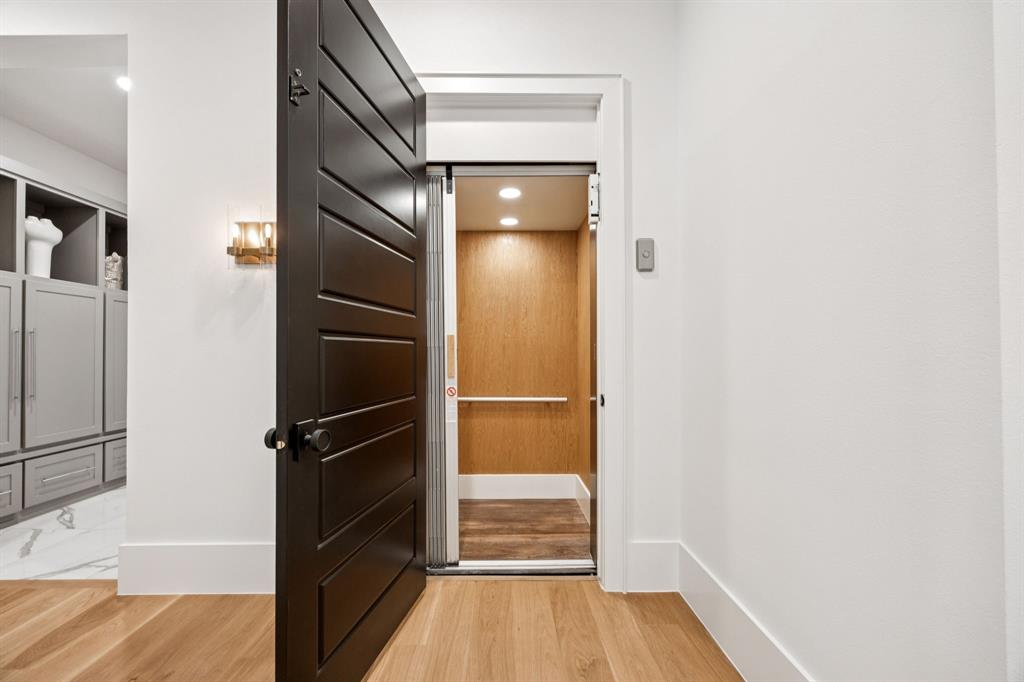 4330 Ridge Road Dallas, TX 75229 - Photo 20 of 30 a view of walk in closet with empty racks