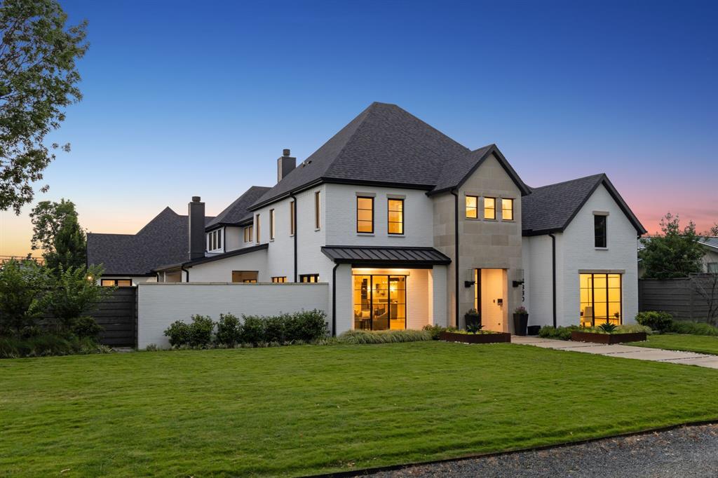 4330 Ridge Road Dallas, TX 75229 - Photo 2 of 30 a front view of a house with a yard