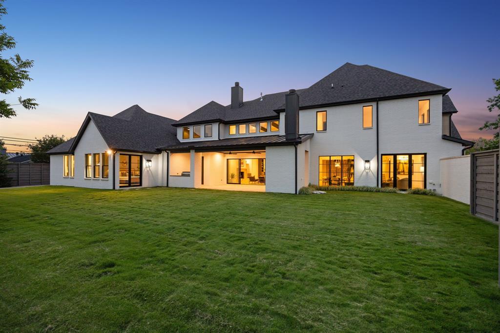 4330 Ridge Road Dallas, TX 75229 - Photo 29 of 30 a front view of a house with garden