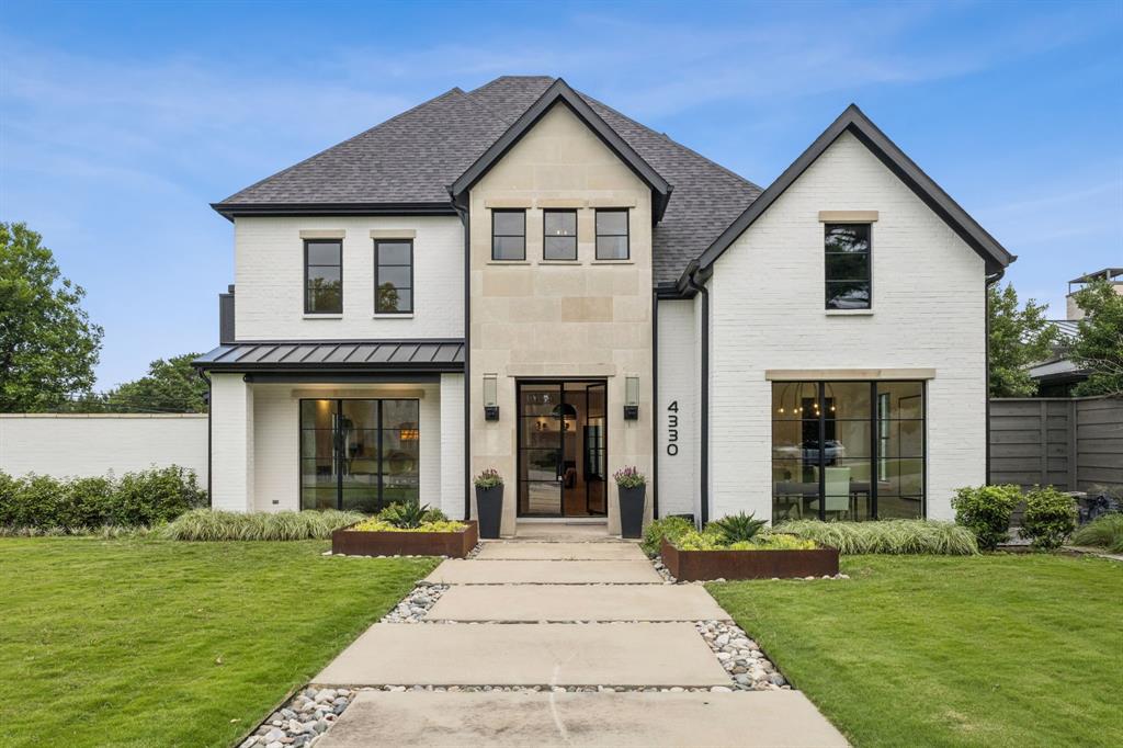 4330 Ridge Road Dallas, TX 75229 - Photo 30 of 30 a front view of a house with a yard and garage