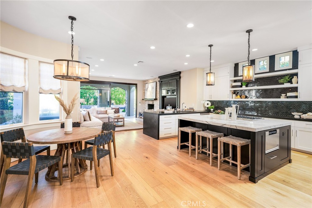 24 Seabluff Newport Beach, CA 92660 - Photo 1 of 1 a open kitchen with stainless steel appliances granite countertop a stove and kitchen island