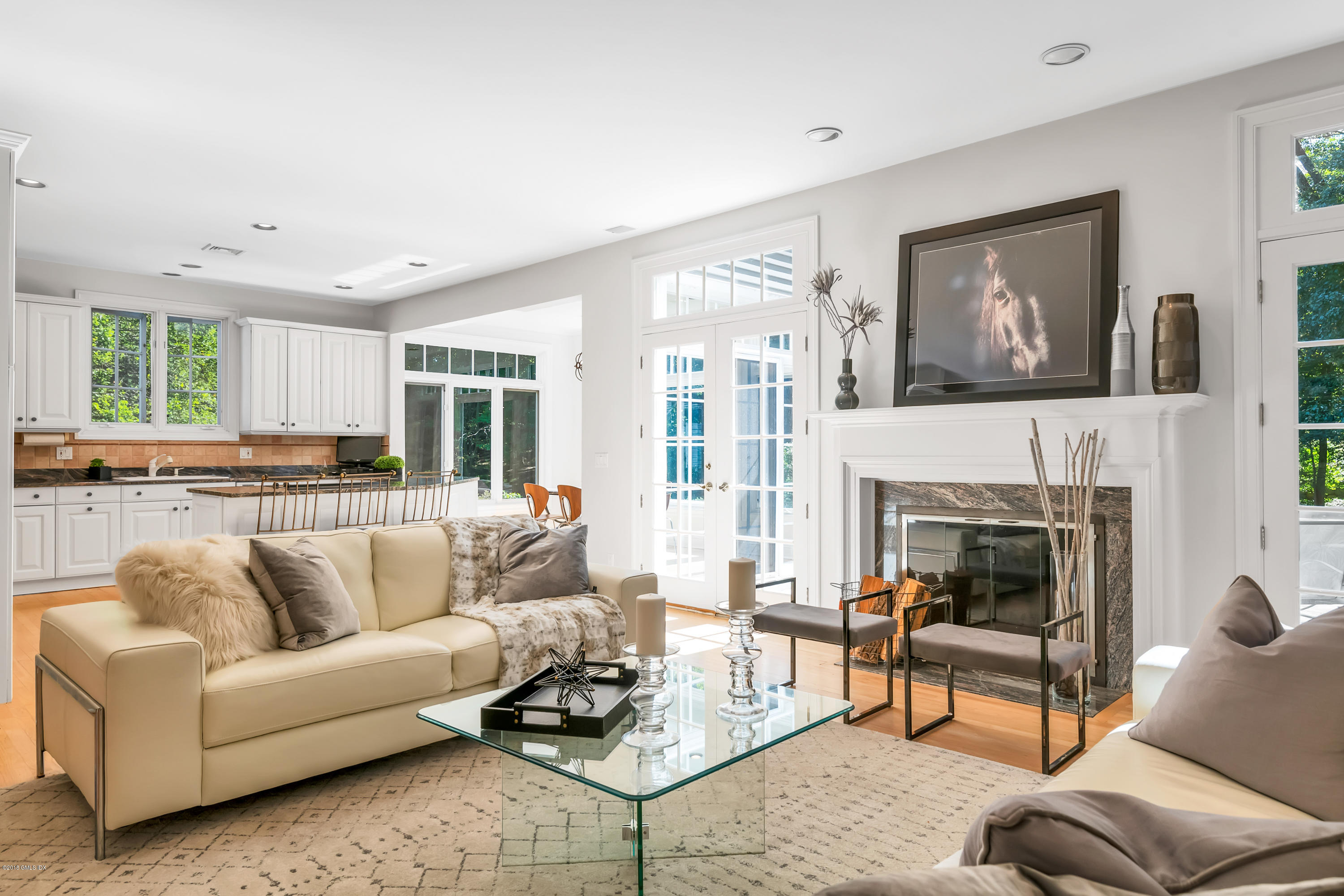 329 Stanwich Road Greenwich, CT 06830 - Photo 13 of 39 a living room with furniture and a fireplace