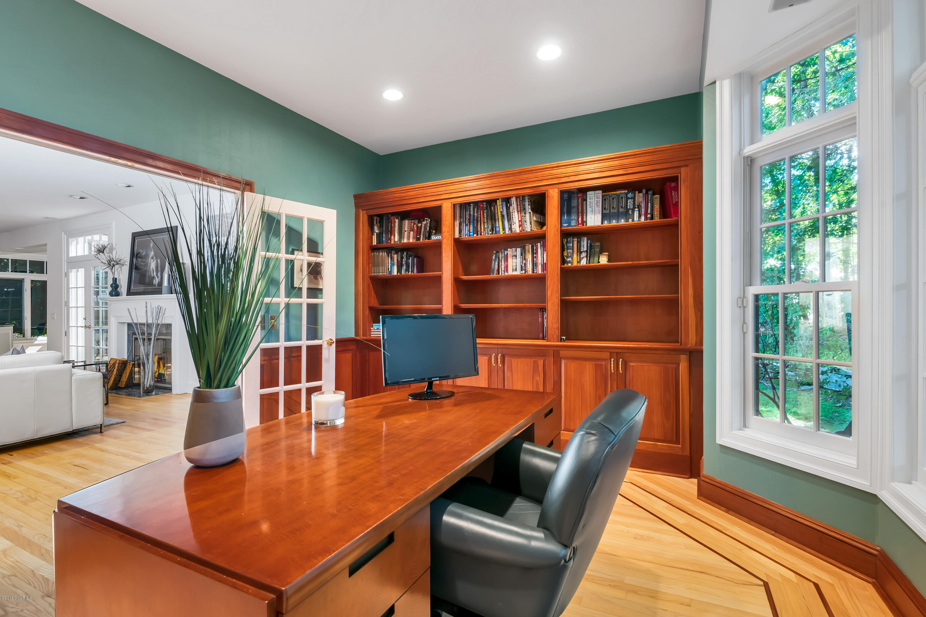 329 Stanwich Road Greenwich, CT 06830 - Photo 16 of 39 a dining room with furniture and a floor to ceiling window