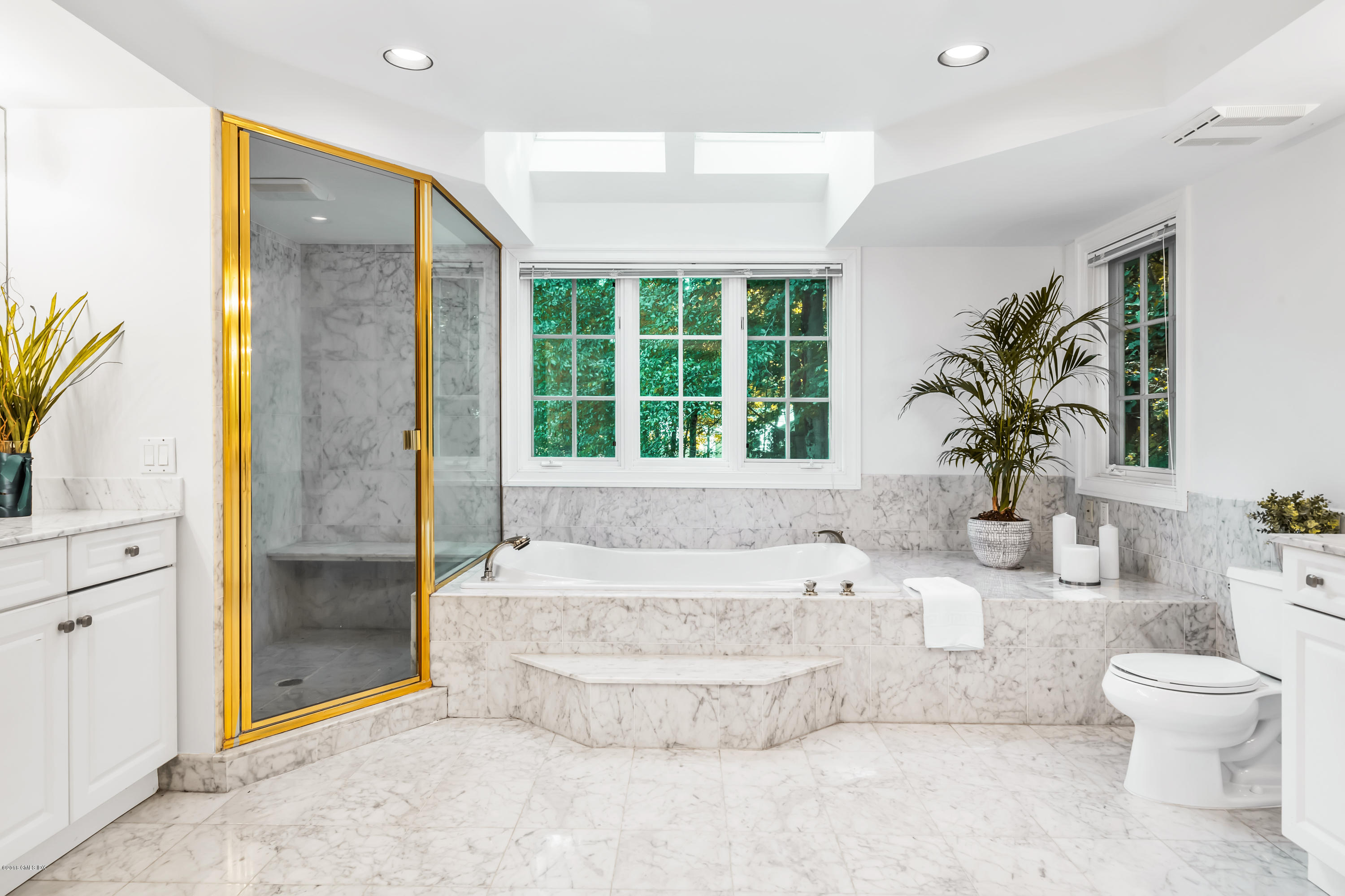 329 Stanwich Road Greenwich, CT 06830 - Photo 21 of 39 a bathroom with a bathtub sink and toilet