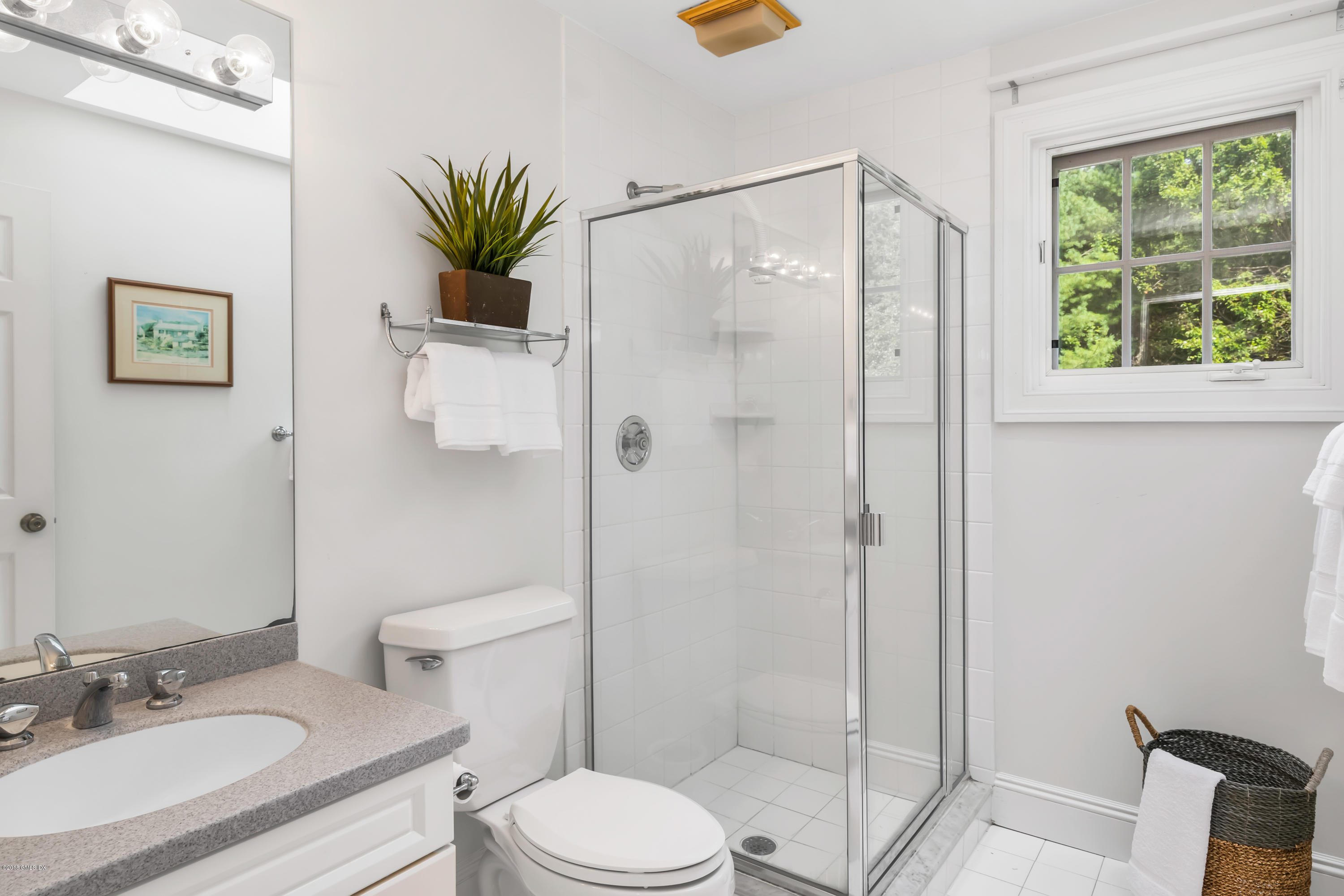 329 Stanwich Road Greenwich, CT 06830 - Photo 26 of 39 a bathroom with a granite countertop sink a toilet and shower