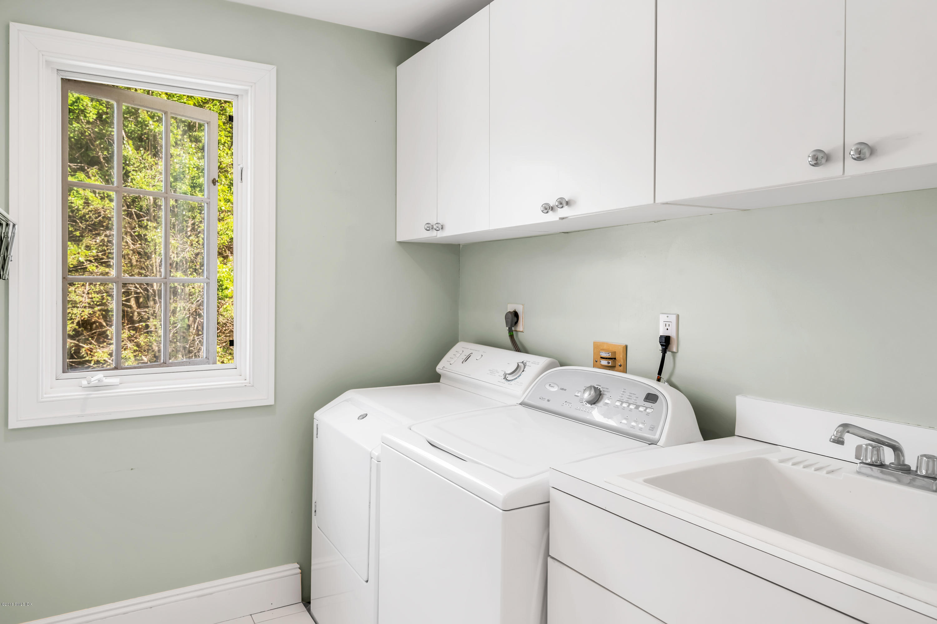 329 Stanwich Road Greenwich, CT 06830 - Photo 30 of 39 a utility room with dryer and washer