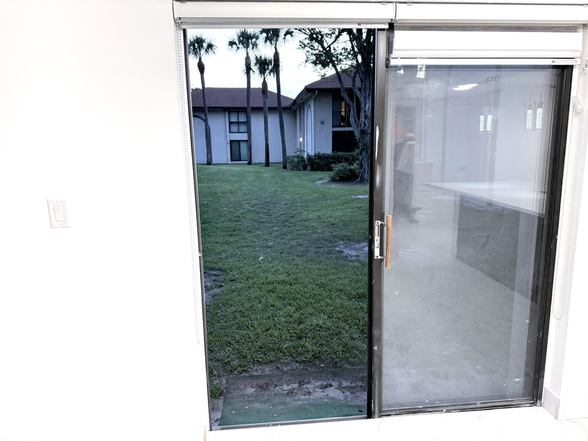 300 East Club Circle, Unit 107 Boca Raton, FL 33487 - Photo 14 of 16 Side sliding door